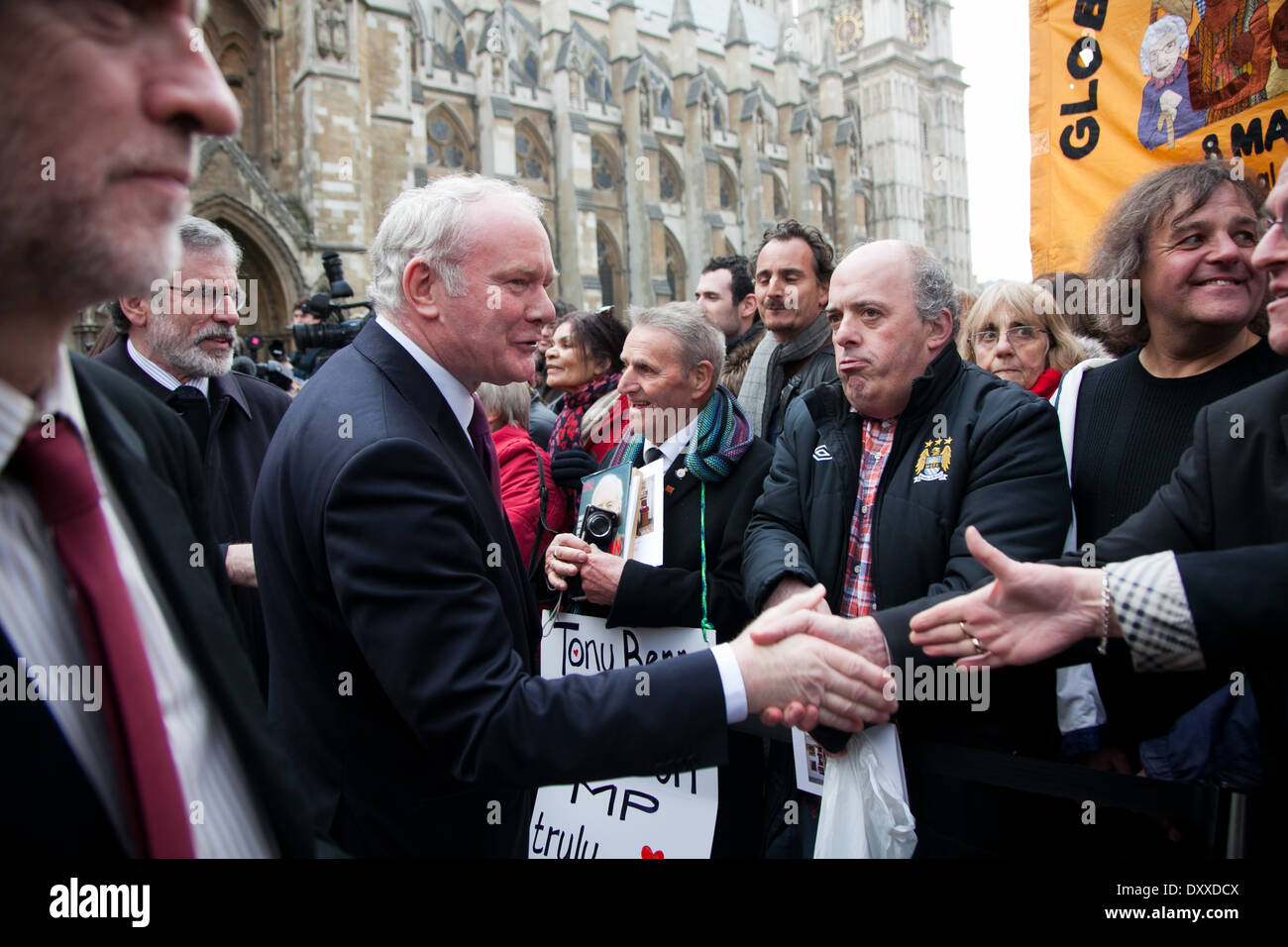 Martin McGuinness and Gerry Adams from Sinn Fein greet some of the mourners attending the funeral of Tony Benn. Stock Photo