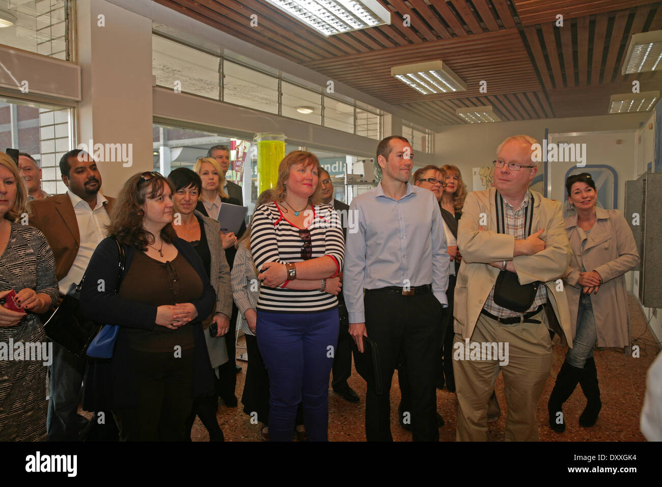 Orpington, Kent, UK. 1st April 2014. A crowd of people listen to a talk