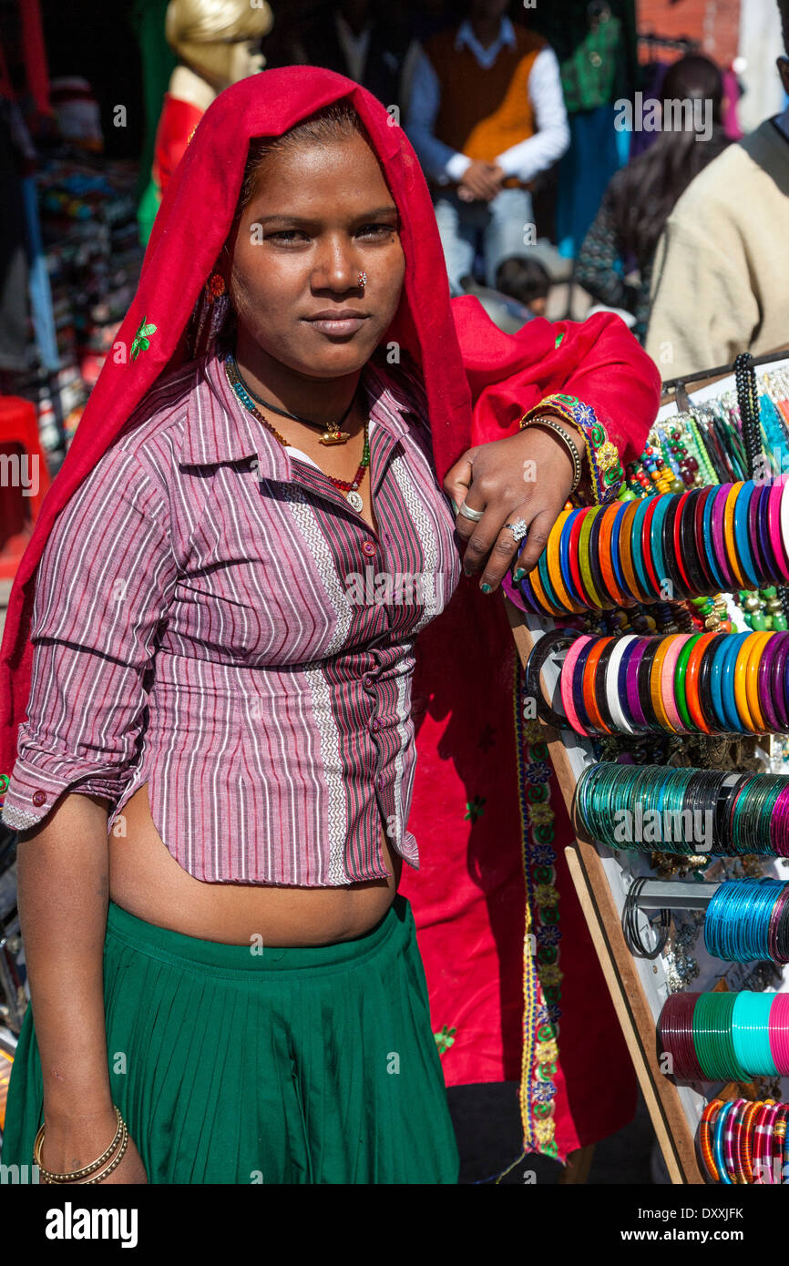 India, Dehradun. Young Woman from Rajasthan Selling Bracelets in the Market. Note her Nose Ring. Stock Photo
