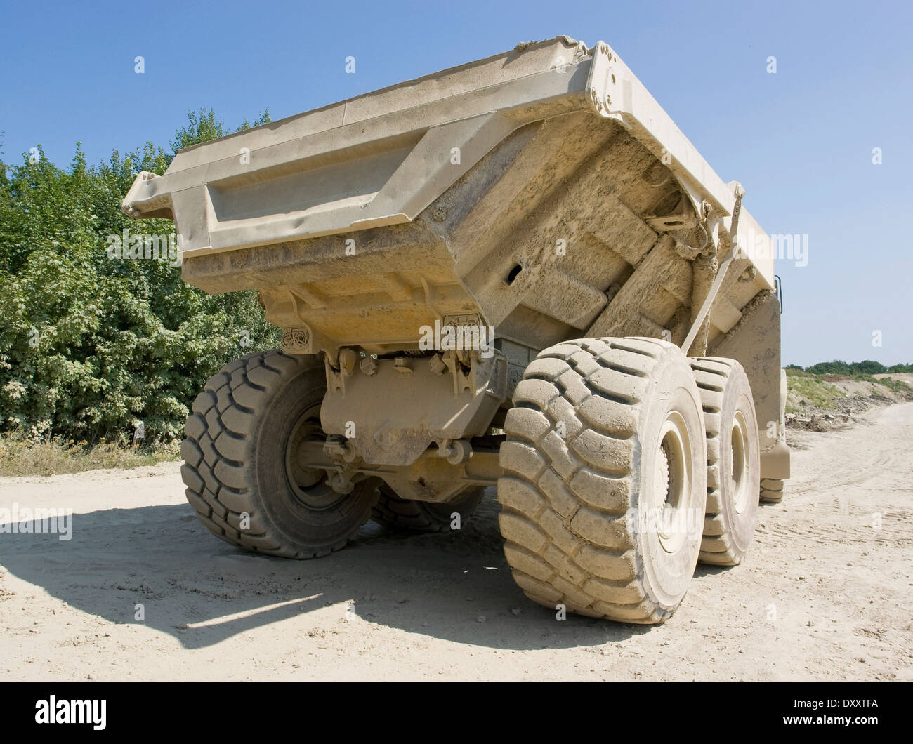 back side of a dirty dumper in sunny ambiance Stock Photo