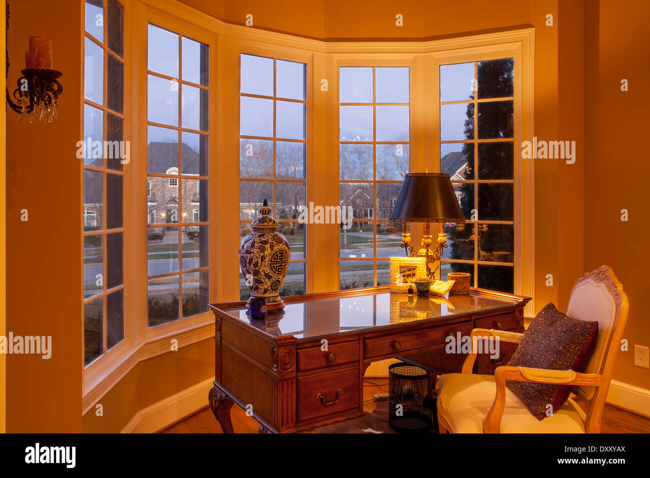 Home office desk set in bay window Stock Photo - Alamy