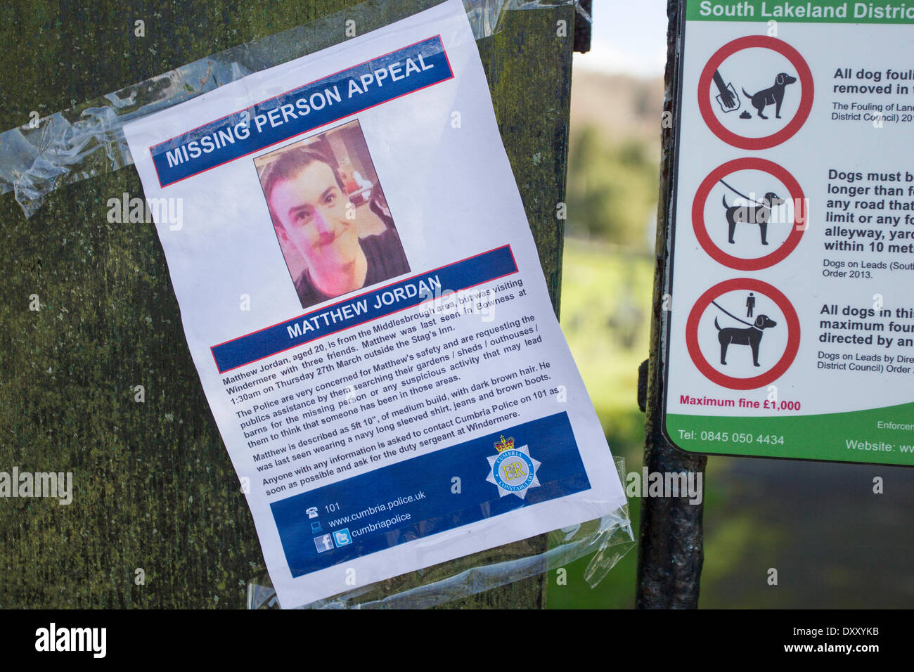 Windermere, UK. 1st April  2014. Lake District police posters around Windermere for missing Teesside student. Police say they are concerned about the welfare of Matthew Jordan Who has now been missing since 1.30am Friday morning. The police today have had divers checking Bowness Bay piers & jetties and between the luxury boats moorings infront of the Old England Hotel Credit:  Gordon Shoosmith/Alamy Live News Stock Photo