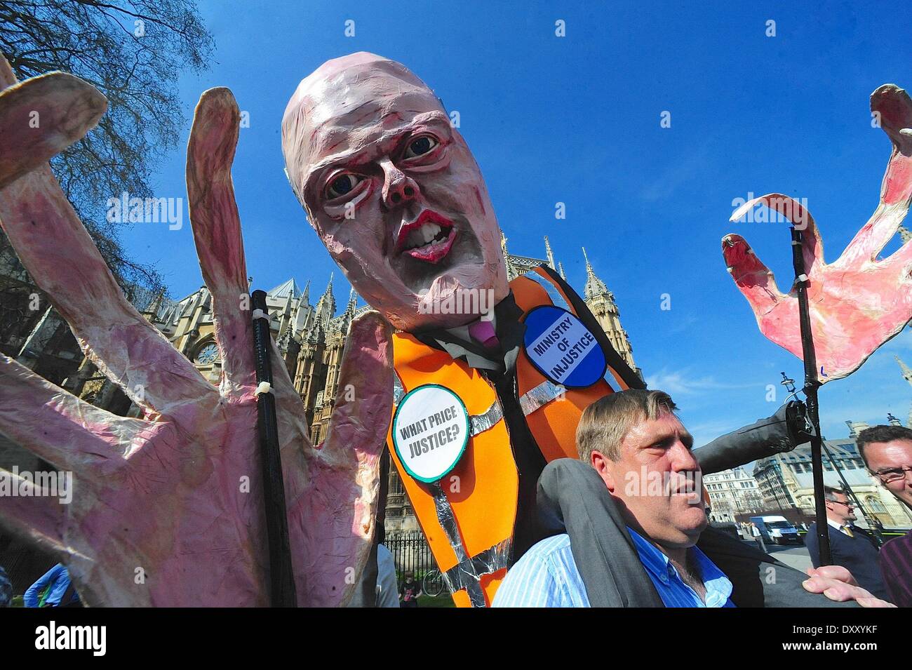 London, UK, UK. 1st Apr, 2014. Lawyers and their supporters protest in front of Westminster over cuts to legal aid and the privatisation of the probation service. © Gail Orenstein/ZUMAPRESS.com/Alamy Live News Stock Photo