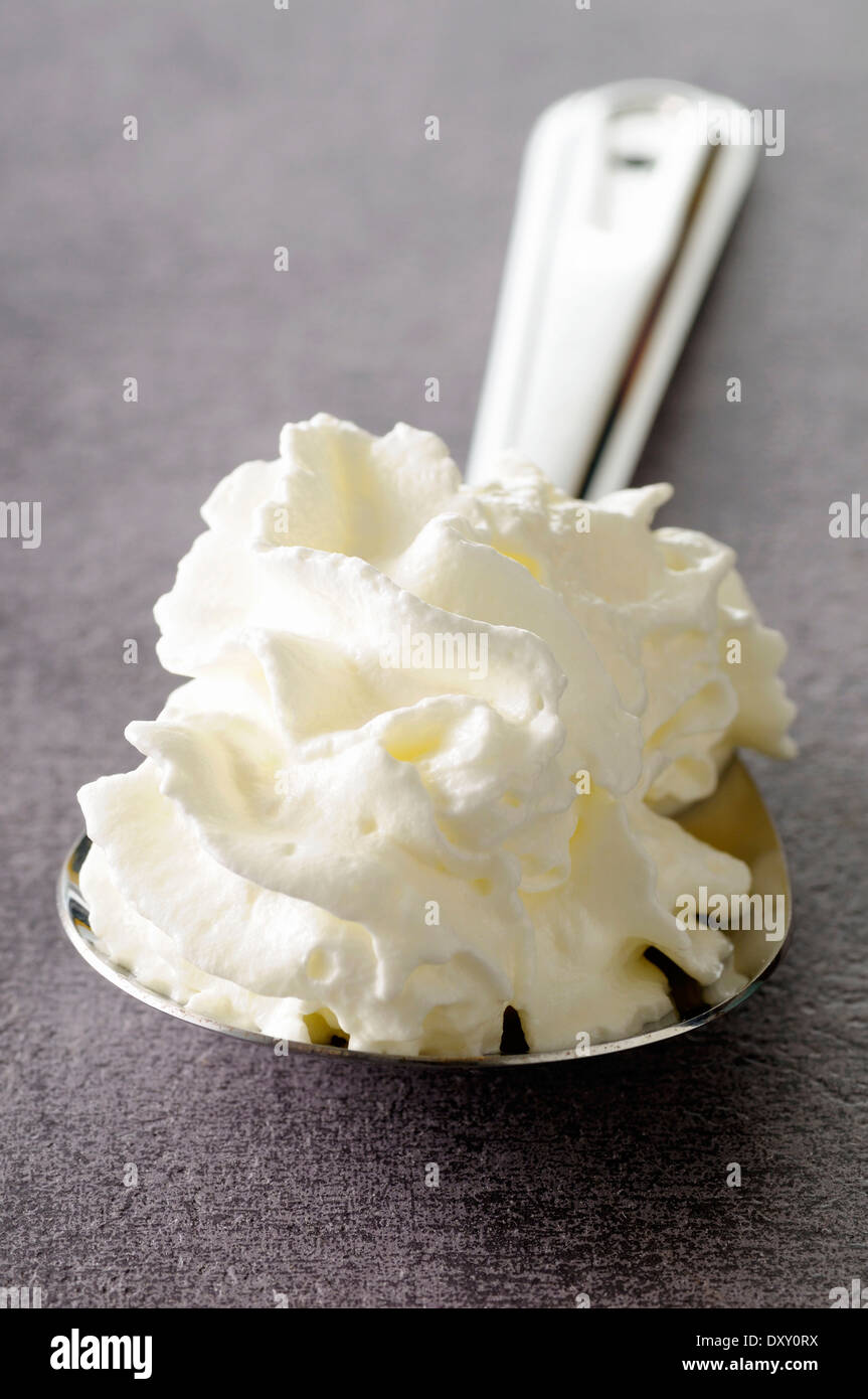 Spoonful of whipped cream Stock Photo