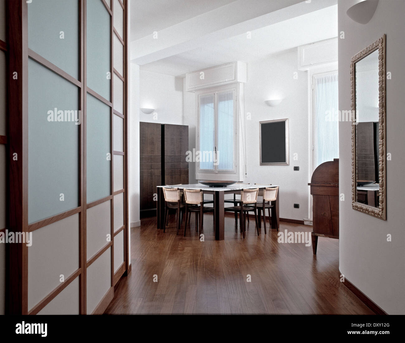 modern dining room with wood floor Stock Photo - Alamy