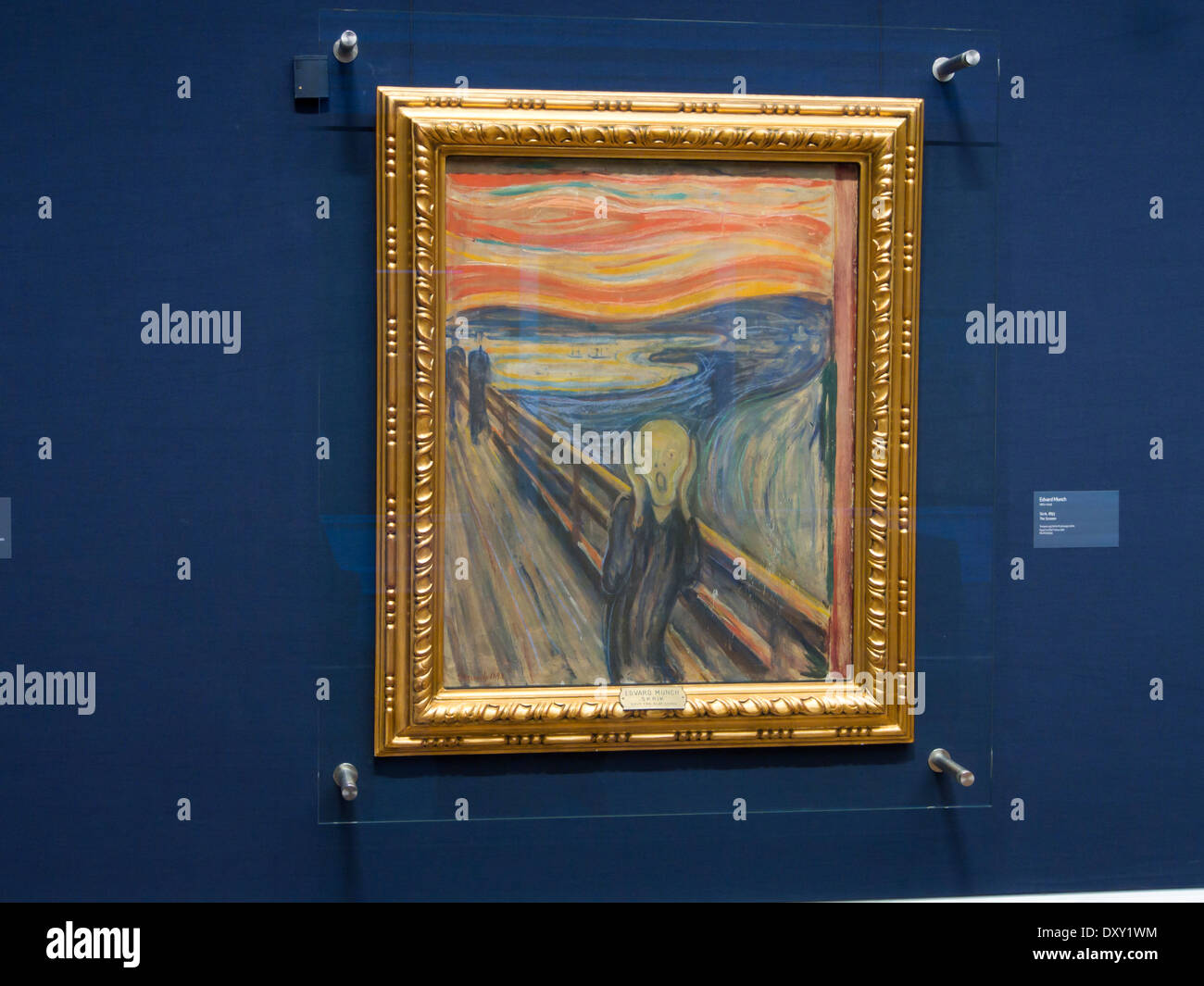 The Norwegian National museum and  gallery in Oslo Norway, painting by Edvard Munch 'Skriket' the scream behind protective glass Stock Photo