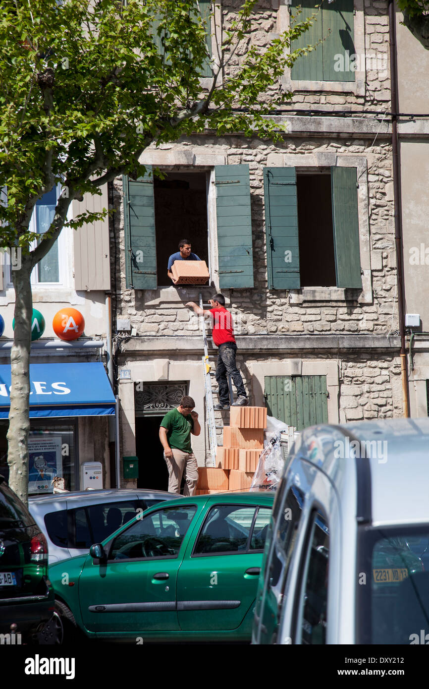 Unloading construction materials hi-res stock photography and images ...