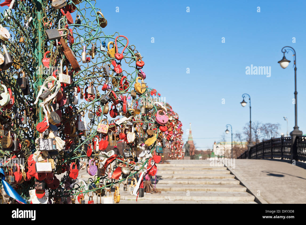 Love Tree with honeymooner padlocks on Luzhkov bridge in spring, Moscow Stock Photo