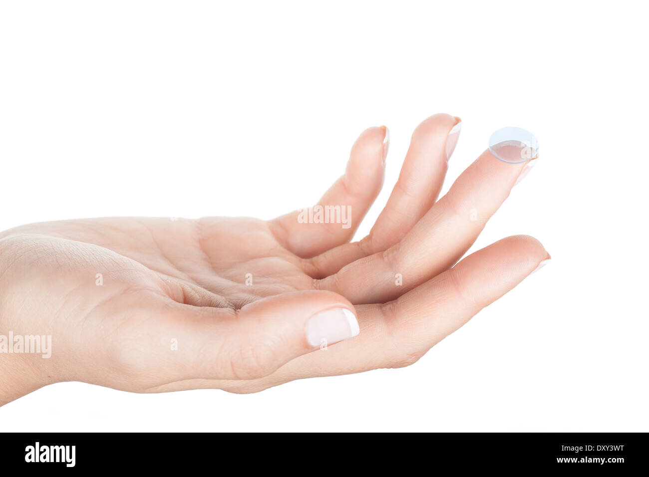 Contact Lens on finger closeup on white background  Stock Photo