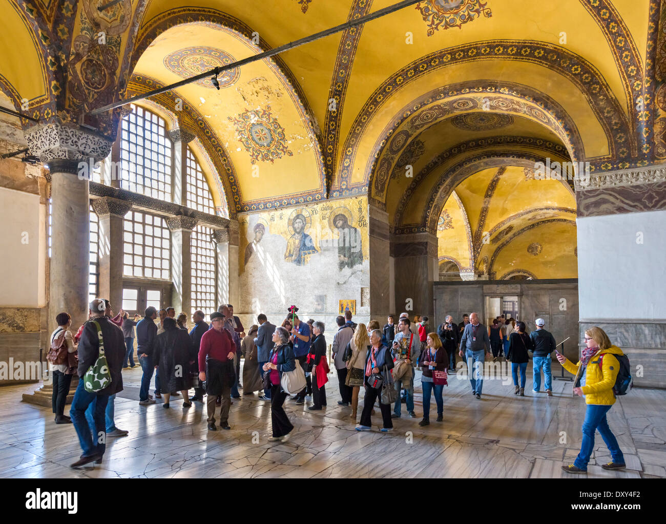 Upper South Gallery with tourists gathered round Deisis mosaic, Hagia Sophia (Aya Sofya), Istanbul,Turkey Stock Photo