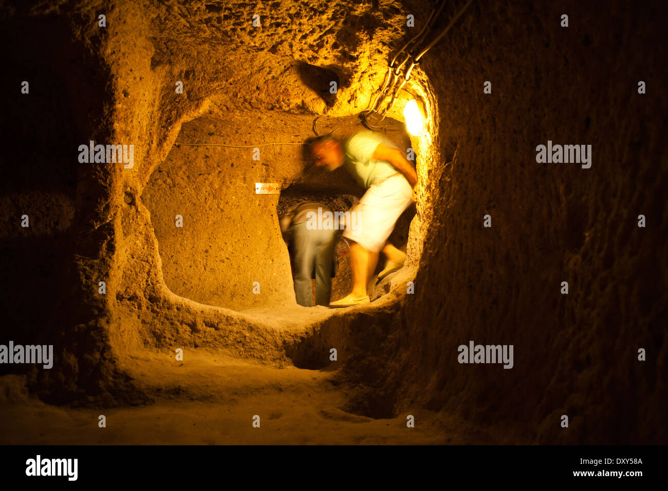 People in Kaymakli underground city in Cappadocia Stock Photo