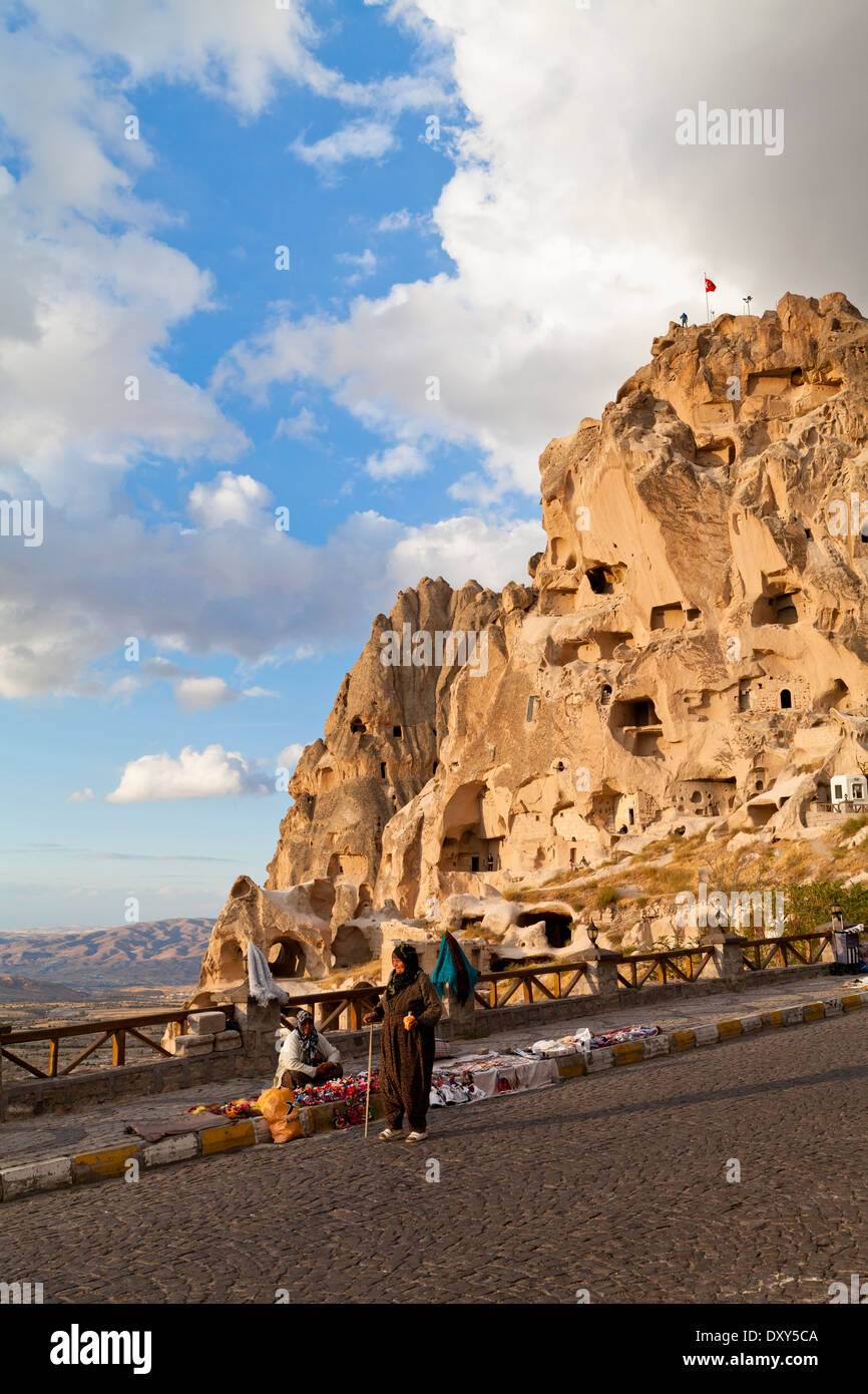 Two old woman with Uchisar Castle in the background Stock Photo