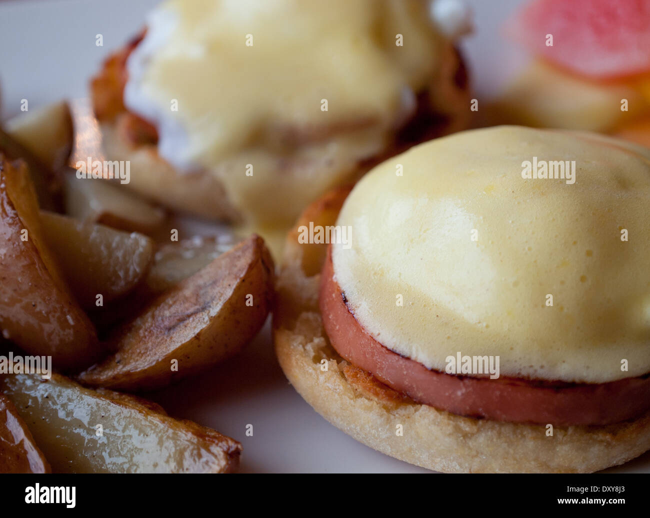 Canadian Eggs Benedict featuring two halves of an English muffin