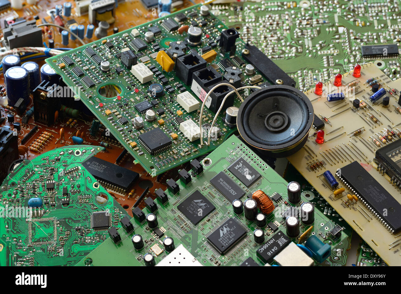 Collection of junk electronic components with microchips and integrated printed circuit boards Stock Photo