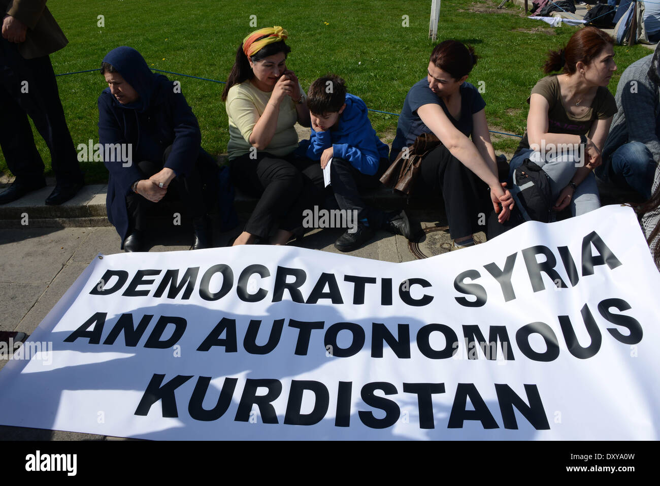 London, UK. 1st April 2014 : Kurds protested outside Parliament. Protesters say the Turkey's and Saudi Arabia Government supports terroists against Syrian Kurds in Syria and Kurdistan. Photo by See Li/Alamy Live News Stock Photo