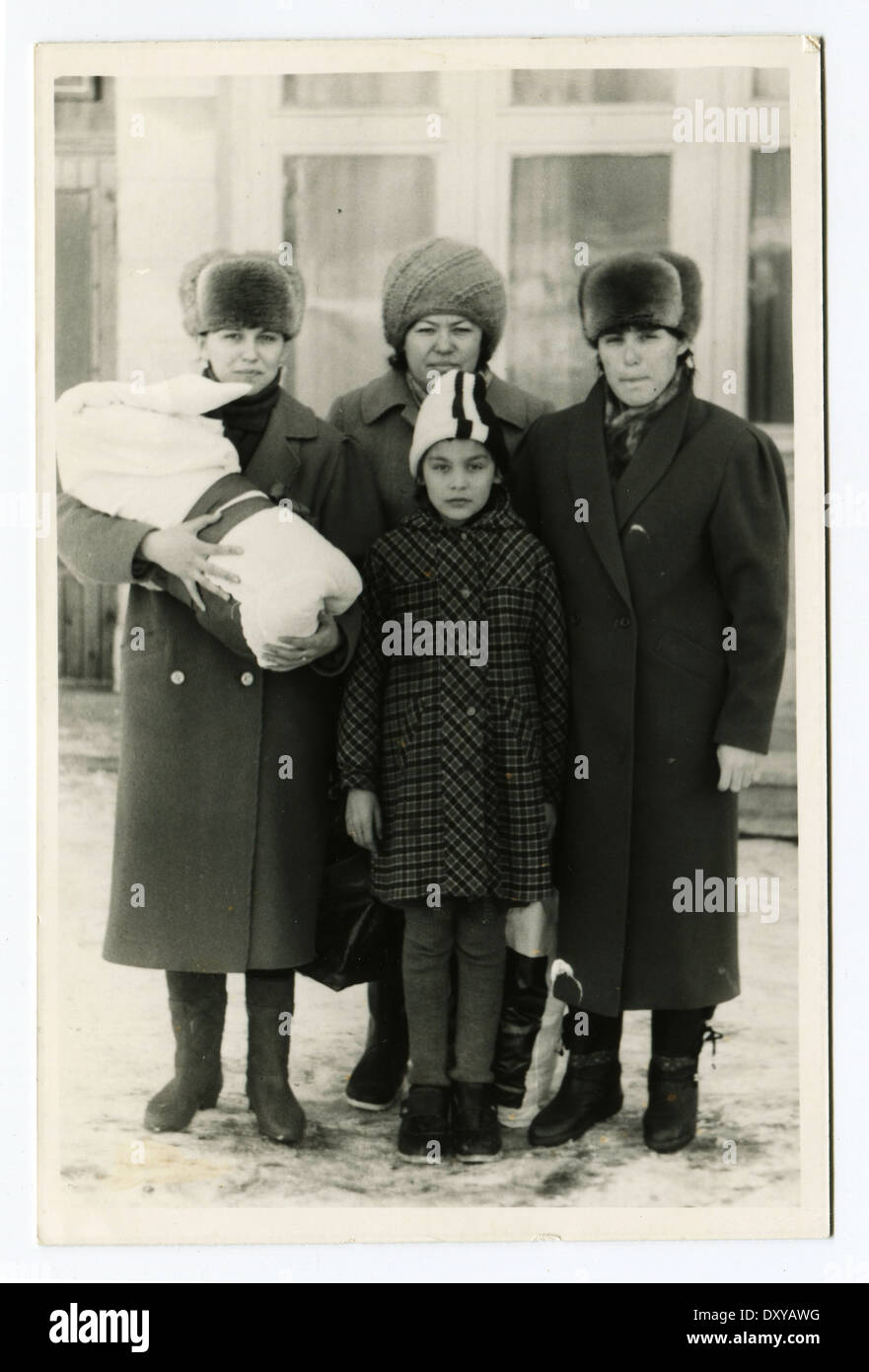 USSR - CIRCA 1960s : An antique photo shows family portrait Stock Photo