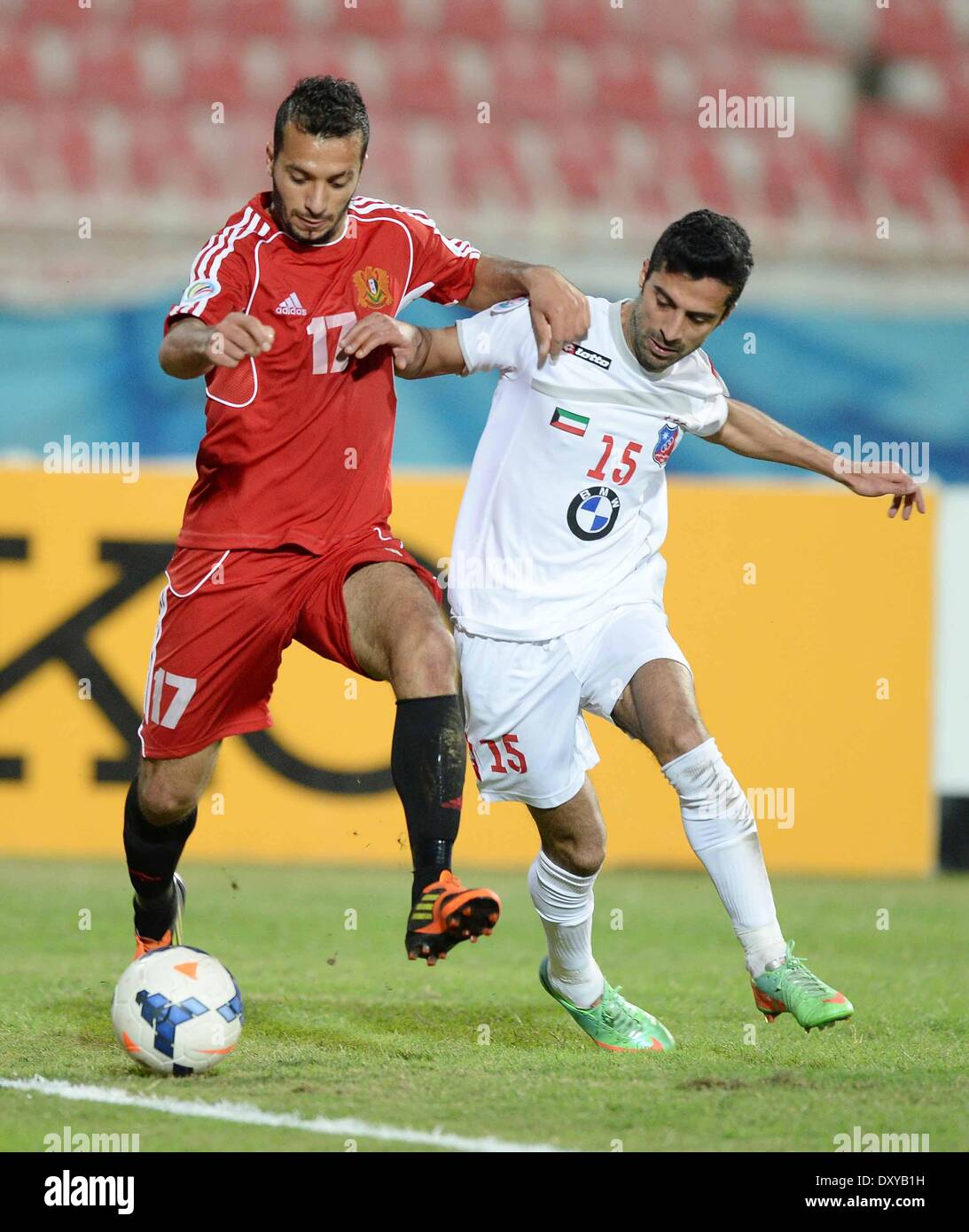 Kuwait City, Kuwait. 1st Apr, 2014. Waleed Ali (R) of Kuwait Sporting