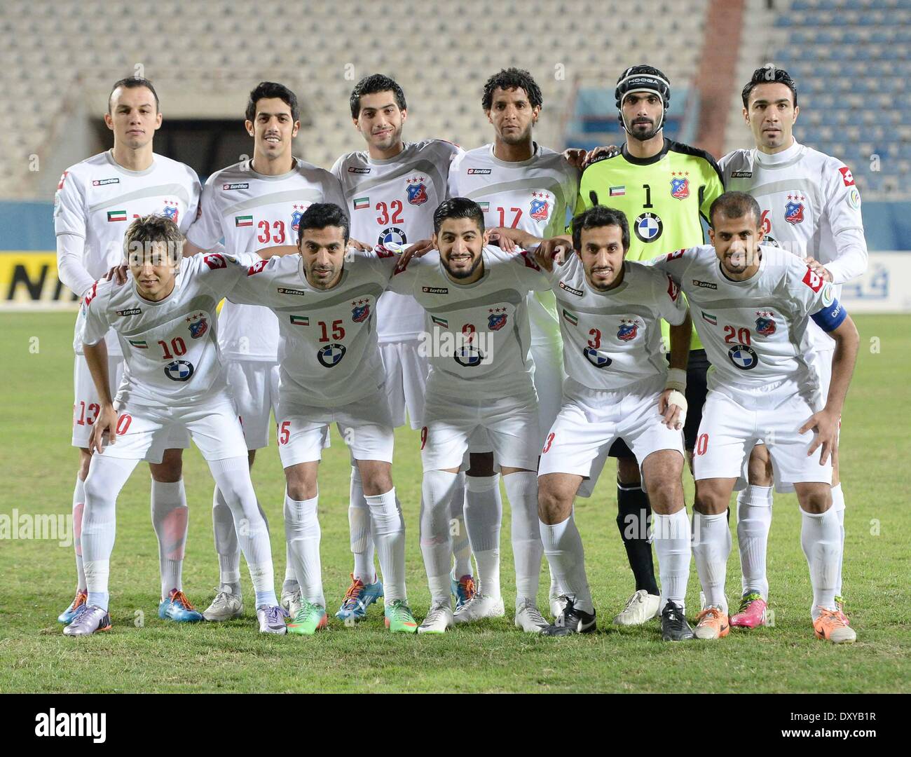 Kuwait City, Kuwait. 1st Apr, 2014. Starting players of Kuwait Sporting Club pose before their