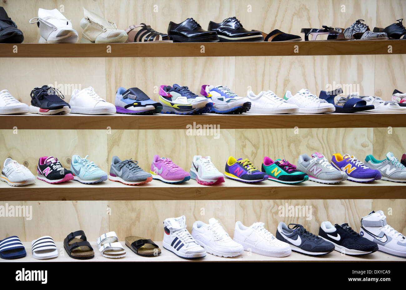 Berlin-Kreuzberg, Germany. 26th Mar, 2014. Numerous sneakers are on display  at 'Voo Store' in Berlin-Kreuzberg, Germany, 26 March 2014. A couple years  ago women in Scandinavia starter wearing sneakers with silk dresses.