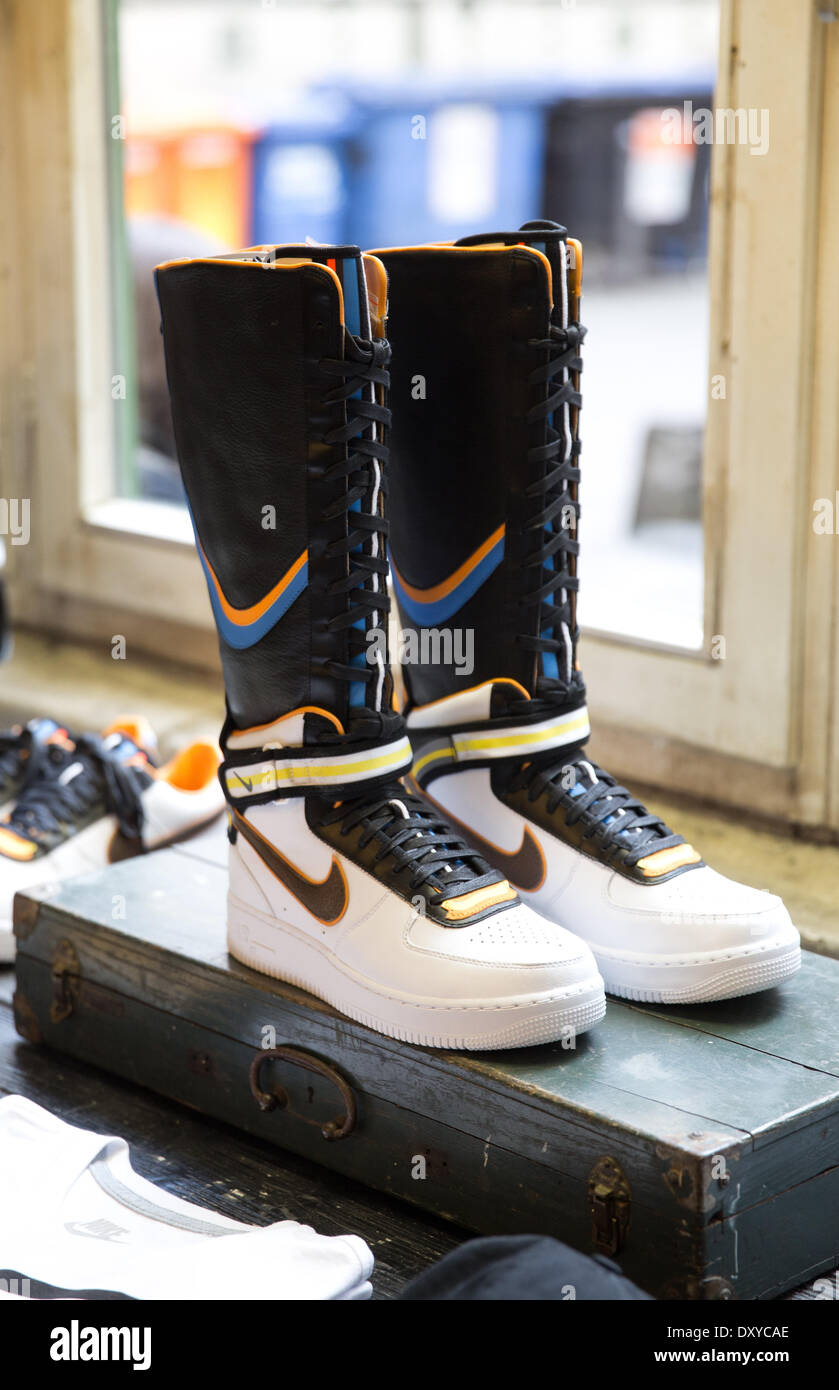 Berlin Kreuzberg Germany. 26th Mar 2014. The sneaker Nike Air Force by Ricardo Tisci is on display in the shop window of Voo Store in Berlin Kreuzberg Germany 26 March 2014. A couple years