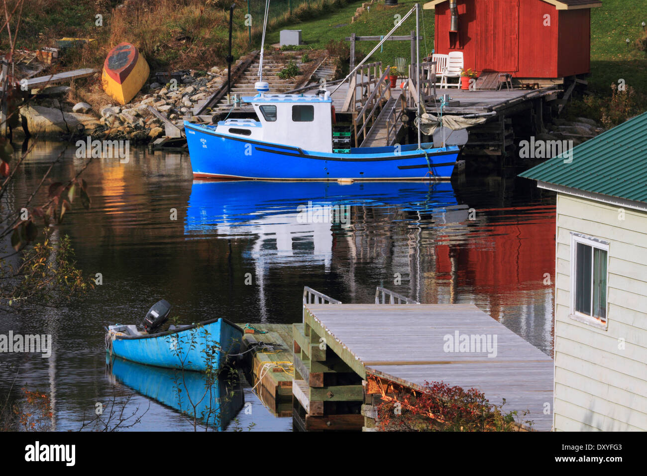 Fishing boat and others at rest in a peaceful inlet Herring Cove