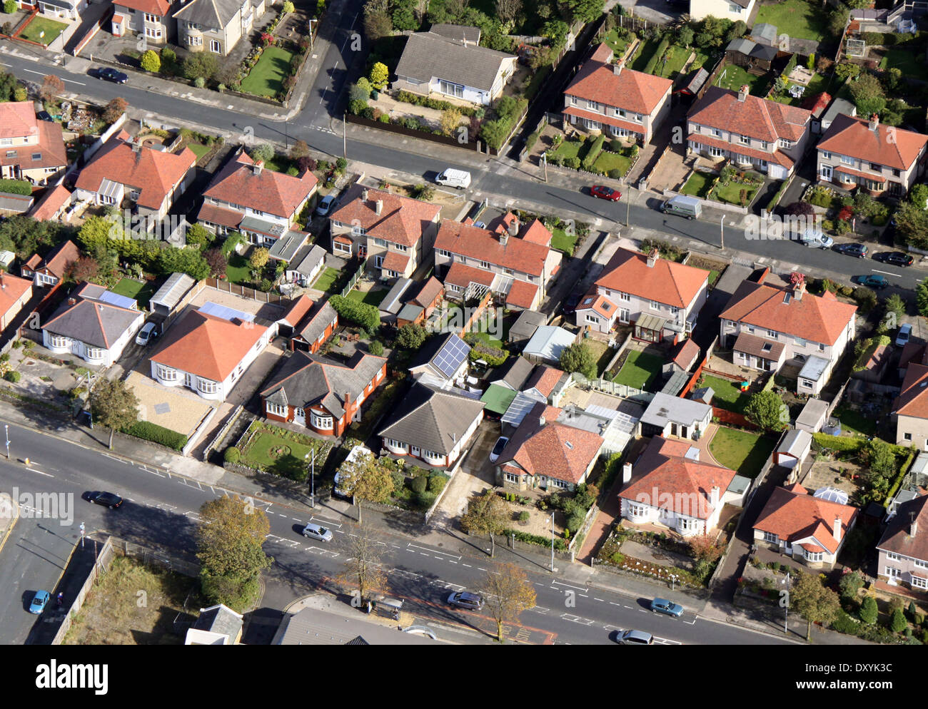 aerial view of bungalows with solar panels on the roof of a garage Stock Photo