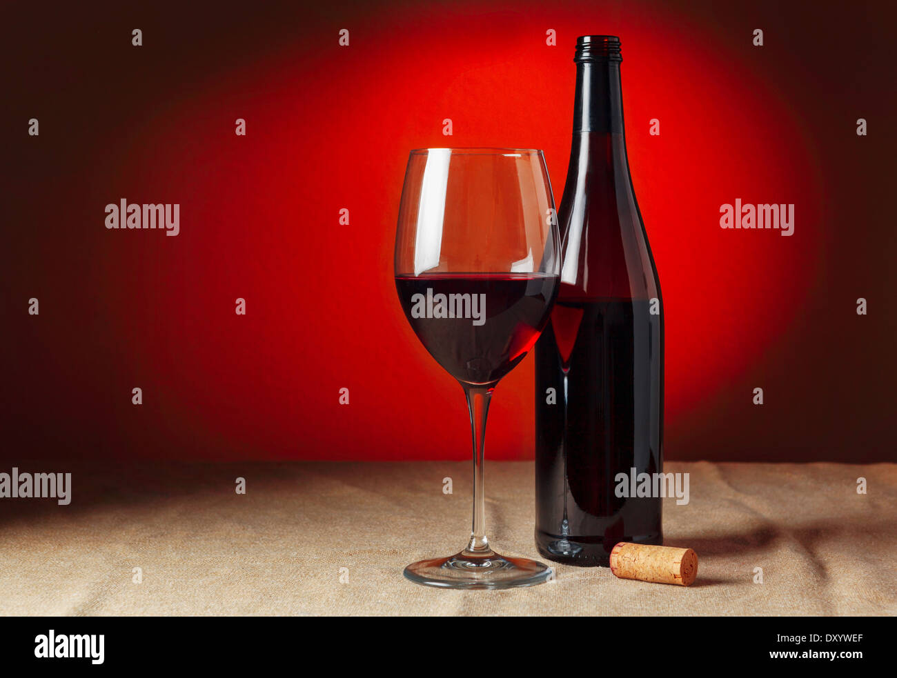 Bottle and glass of red wine - studio shot Stock Photo