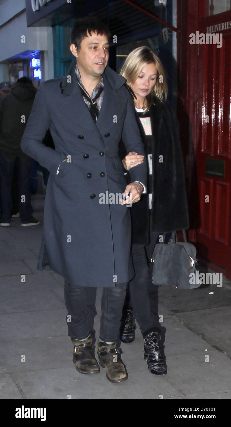 Kate Moss and Jamie Hince out shopping in Notting Hill. On the way home Kate rented a DVD film Featuring: Kate Moss,Jamie Hince Where: London United Kingdom When: 30 Nov 2012 Stock Photo