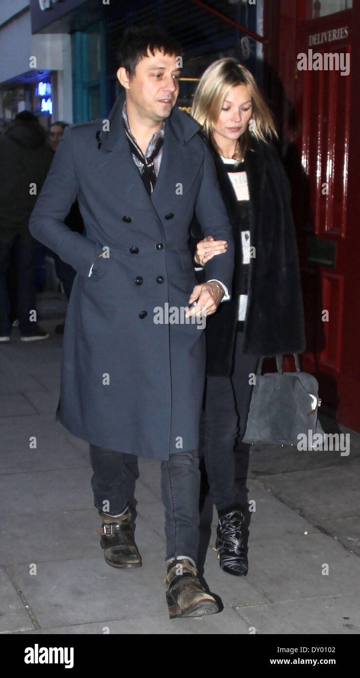 Kate Moss and Jamie Hince out shopping in Notting Hill. On the way home Kate rented a DVD film Featuring: Kate Moss,Jamie Hince Where: London United Kingdom When: 30 Nov 2012 Stock Photo