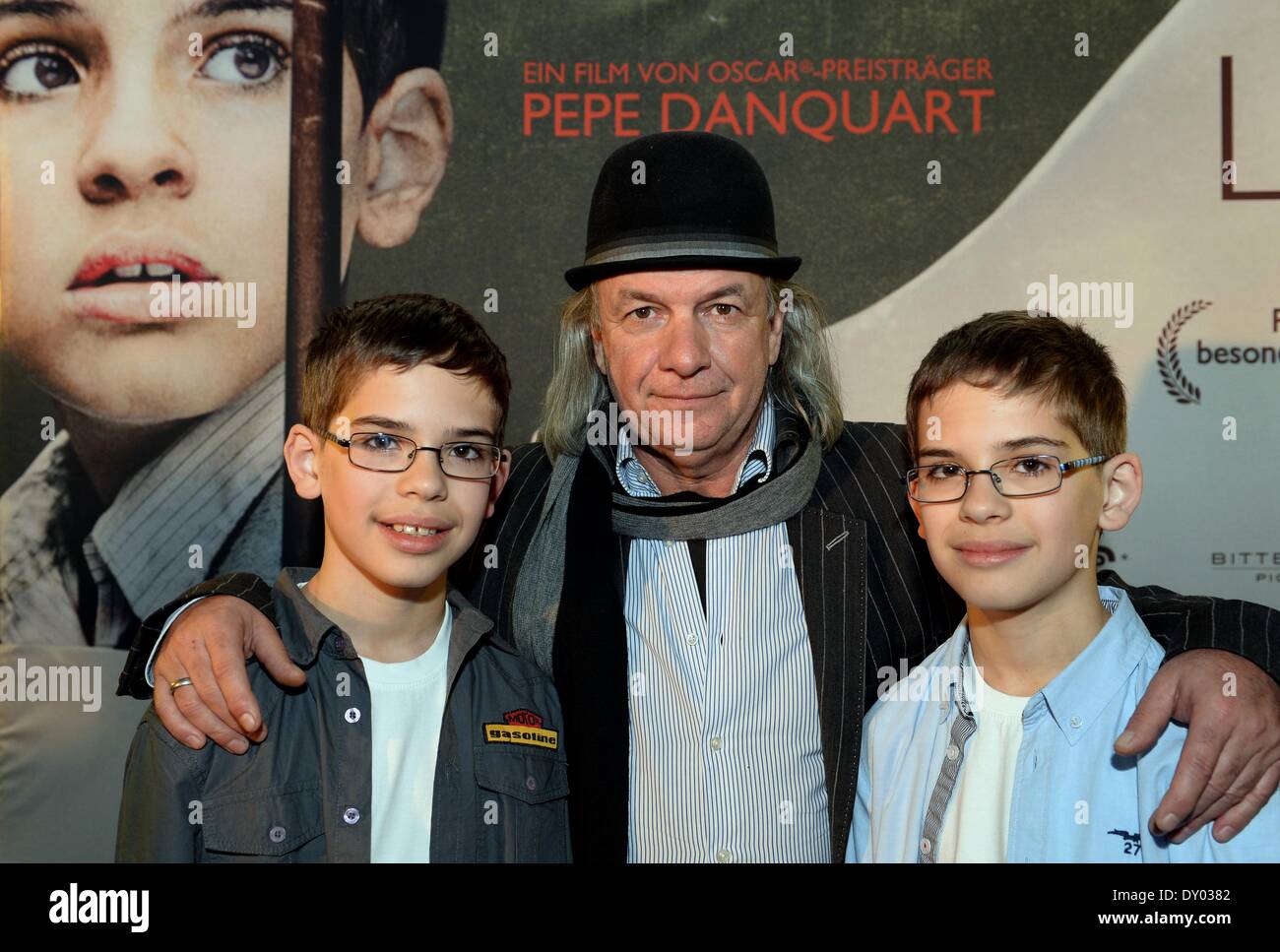 German director Pepe Danquart poses with Polish actors and cast members Kamil Tkacz (L) and Andrzej Tkacz (R) prior the German premiere of 'Lauf Junge Lauf' (lit: Run Boy Run) in Halle an der Saale, Germany, 01 April 2014. The German-French-Polish co-production starts across German theaters on 17 April. Photo: Hendrik Schmidt/dpa Stock Photo
