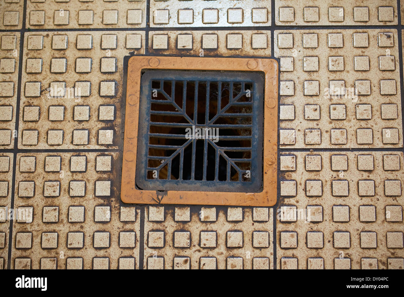 Floor drain in gents toilet Stock Photo Alamy