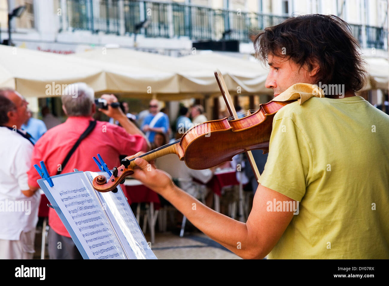 Violinist playing in the street, Lisbon Stock Photo