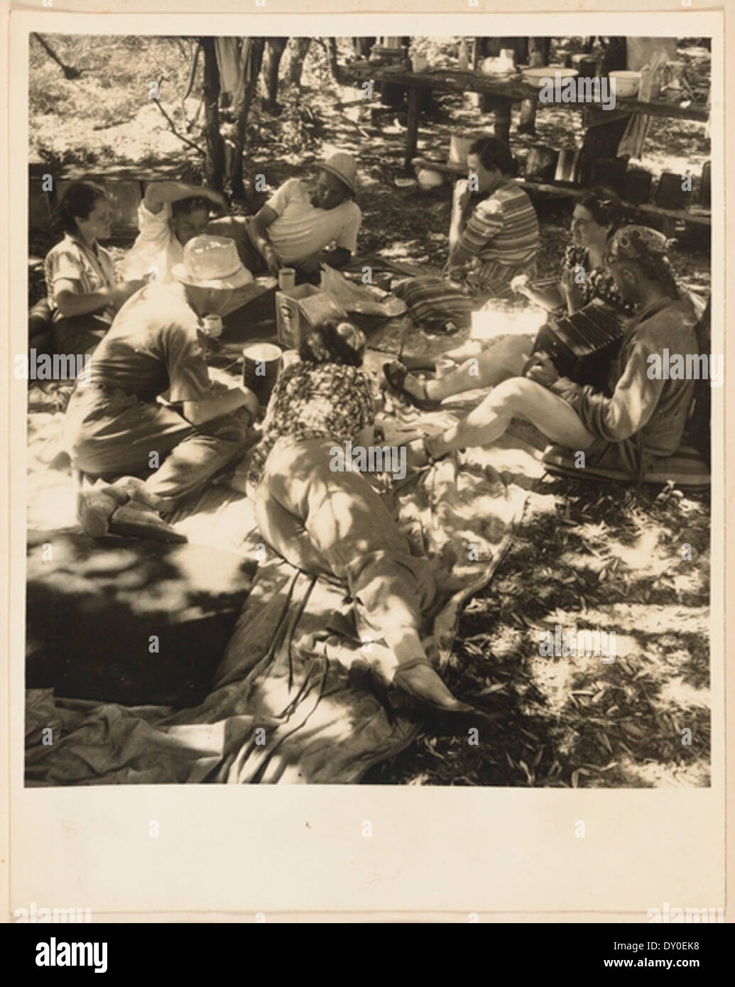 Campfire scene from Camping trips on Culburra Beach by Max Dupain and Olive Cotton Stock Photo