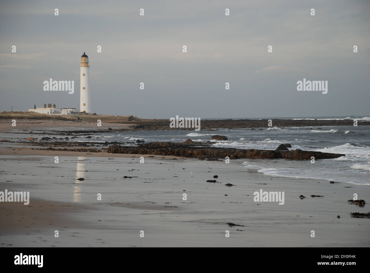Barns Ness Lighthouse near Dunbar on the River Forth estuary. It stands along the beach from Torness Nuclear power station. Stock Photo