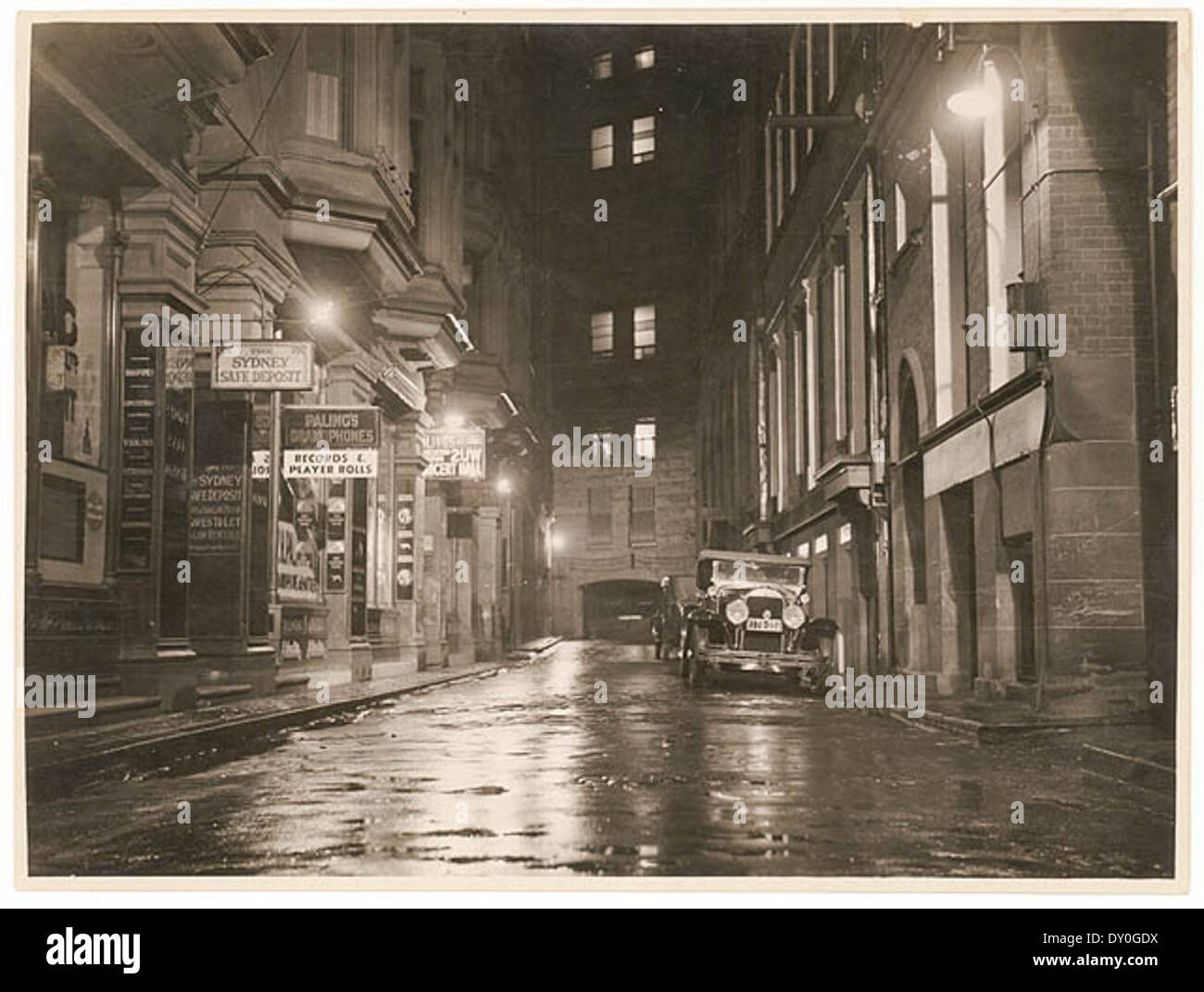 A wet Angel Place, Sydney, 1930s / Sam Hood Stock Photo