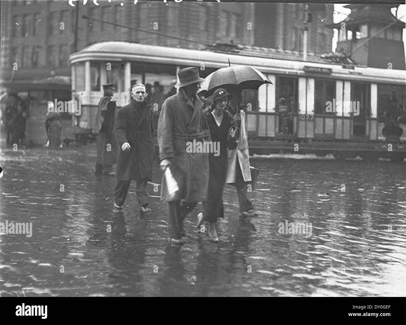 Heavy rain umbrella city Black and White Stock Photos & Images - Alamy
