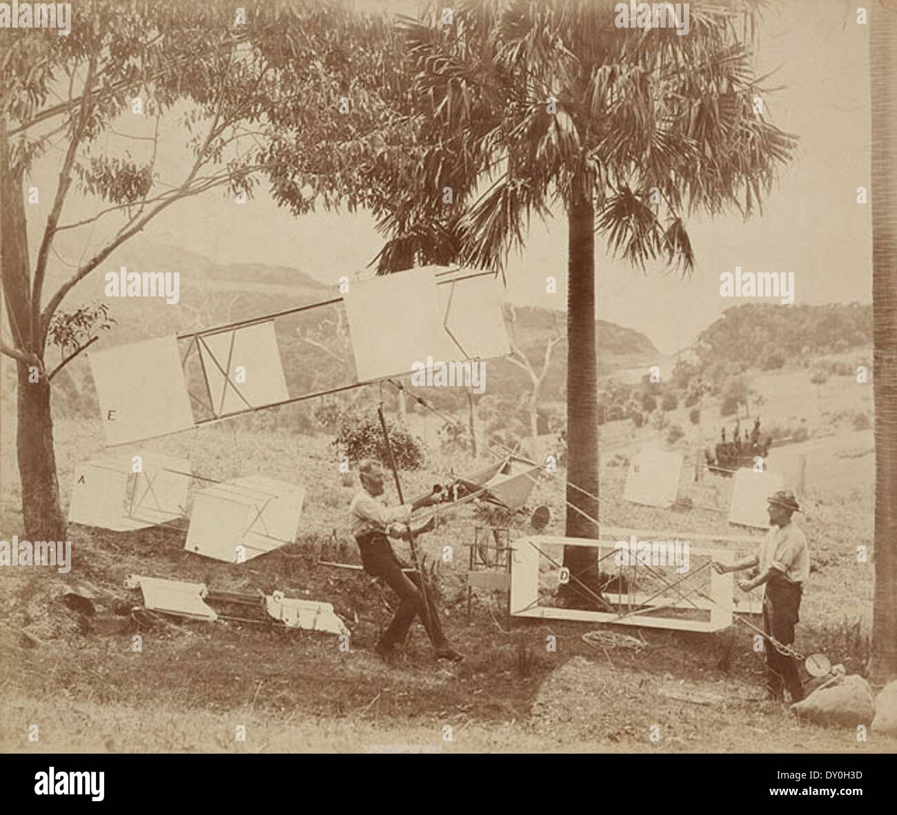Lawrence Hargrave and James Swaine with the kites and other gear used in the kite-lift experiment at Stanwell Park beach, 12 November 1894 / photographed by C. Bayliss Stock Photo