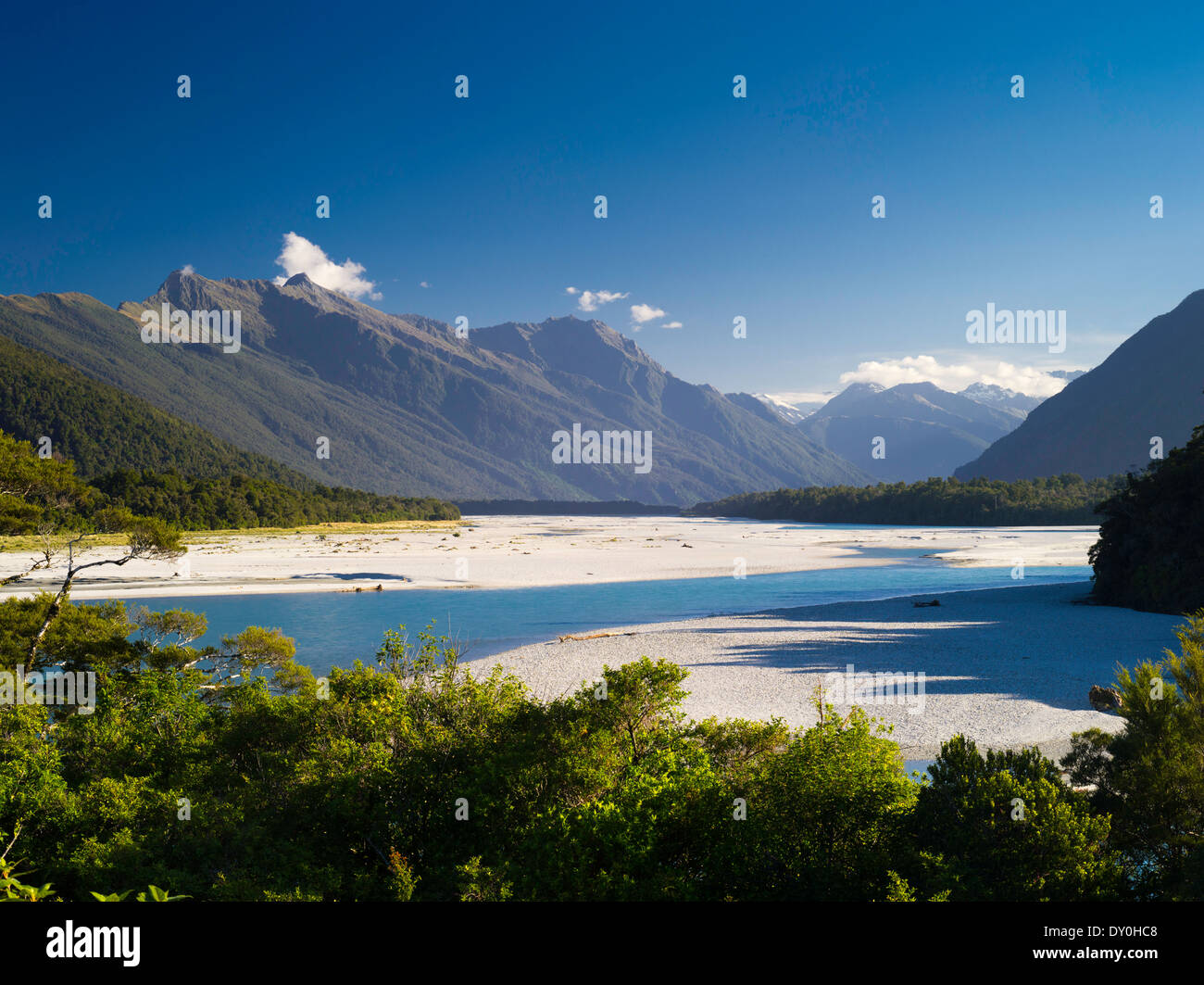 View of the Arawhata River and the Haast Range of the Southern Alps, West Coast, New Zealand. Stock Photo