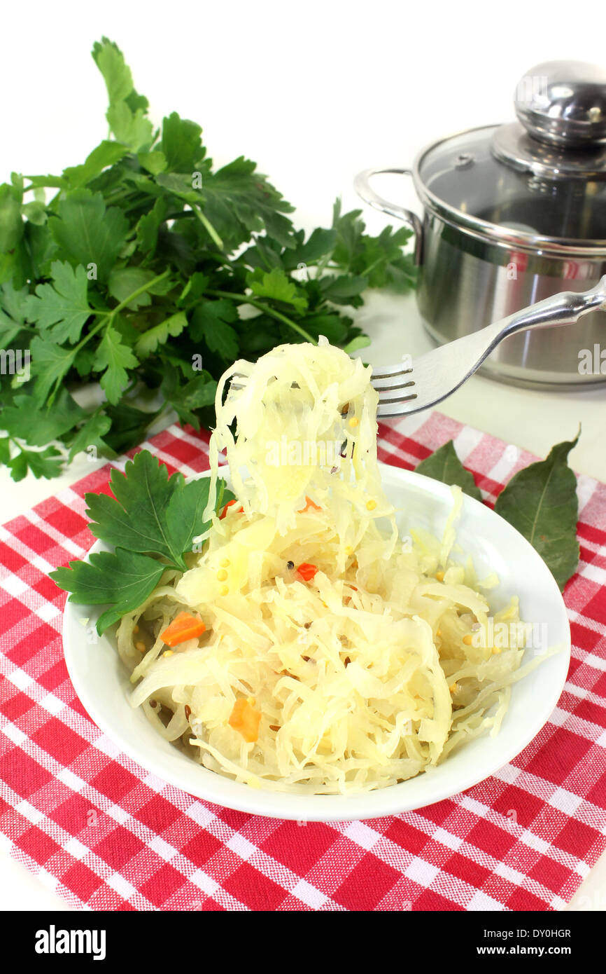 A white bowl with fresh sauerkraut Stock Photo