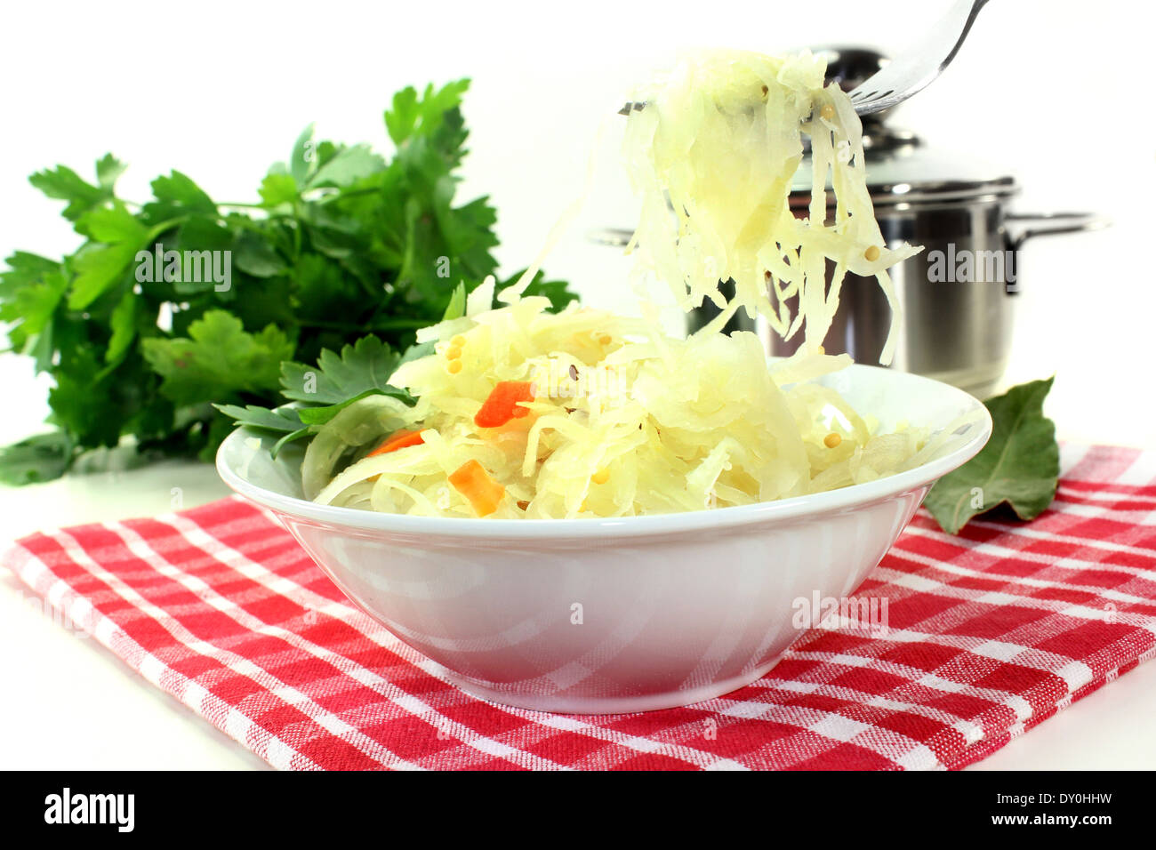 A white bowl with fresh sauerkraut Stock Photo