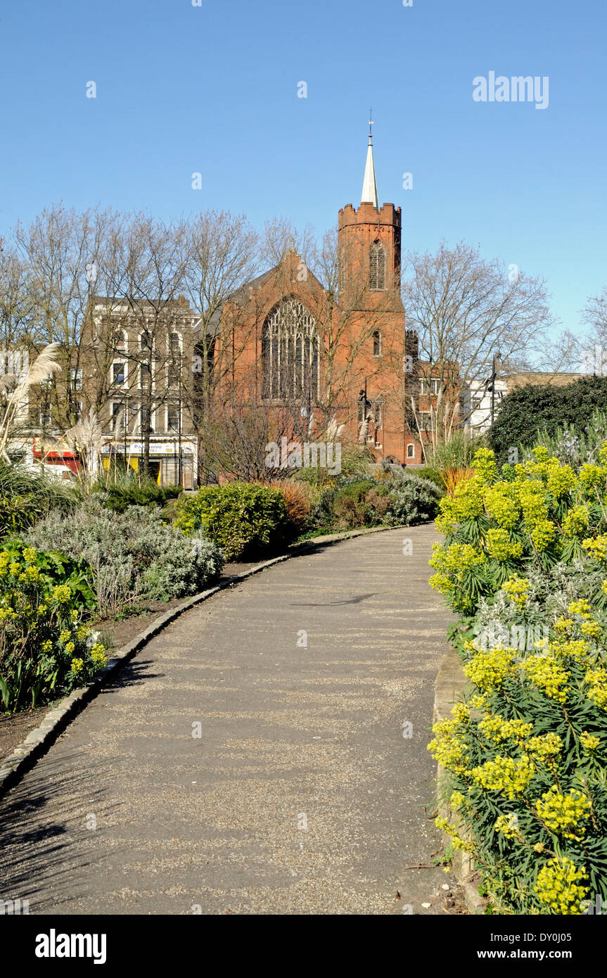 Path, Mile End Park with The Guardian Angels RC Church in the distance, London Borough of Tower Hamlets, Engalnd UK Stock Photo