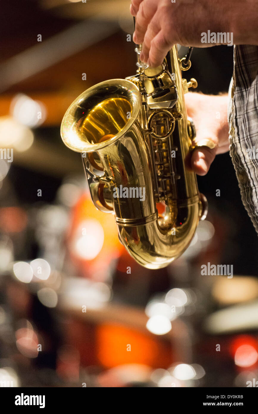 Playing a saxophone; Winnipeg, Manitoba, Canada Stock Photo - Alamy