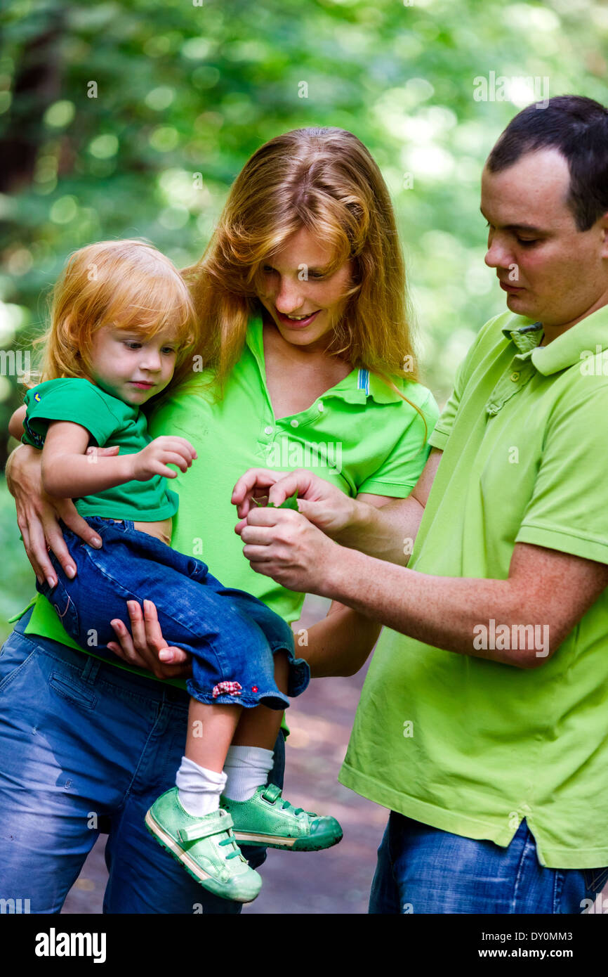Portrait of Happy Family In Park - outdoor shot Stock Photo - Alamy