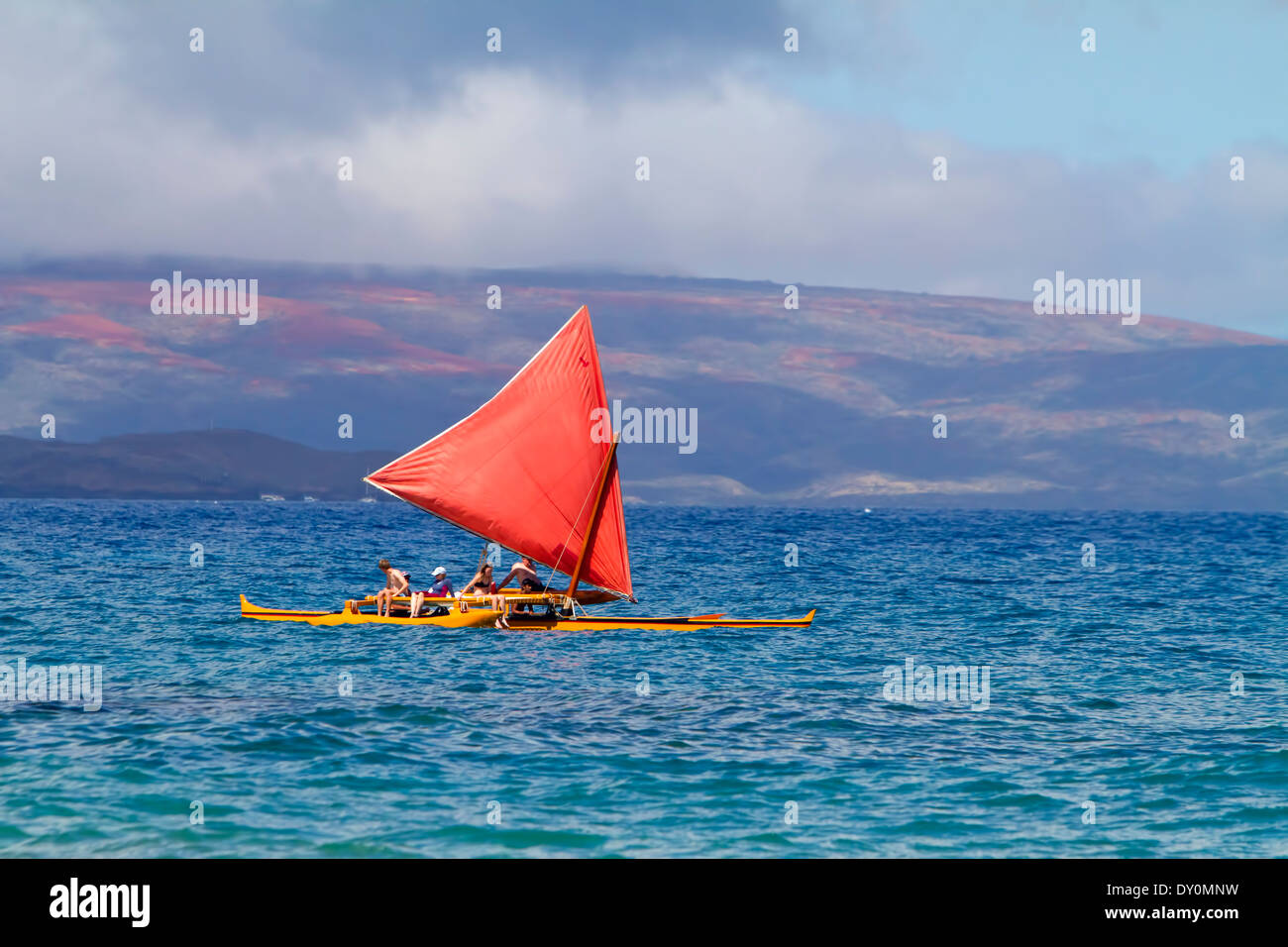 Hawaiian sailing canoe off Maui's south shore; Makena, Maui, Hawaii, United States of America Stock Photo