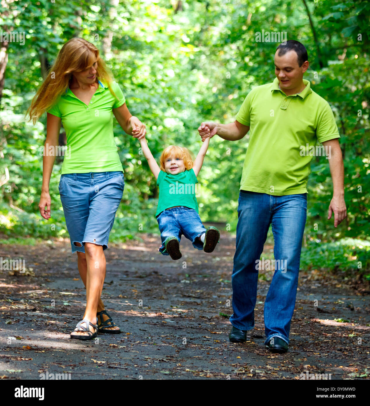 Portrait of Happy Family In Park - outdoor shot Stock Photo - Alamy