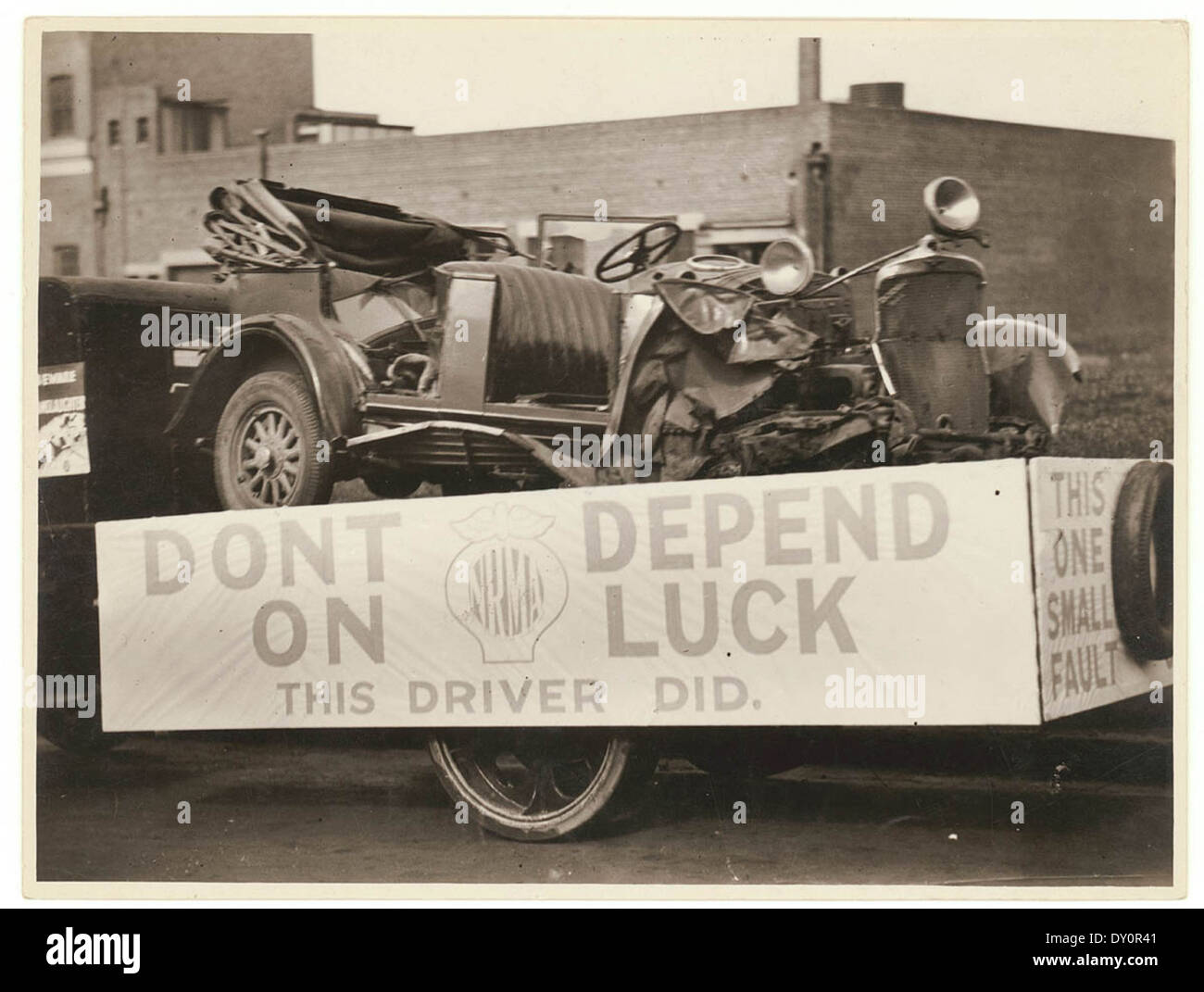 ['Don't depend on luck. This driver did.' Wrecked car used for NRMA advertisement], c. 1930 by Sam Hood Stock Photo