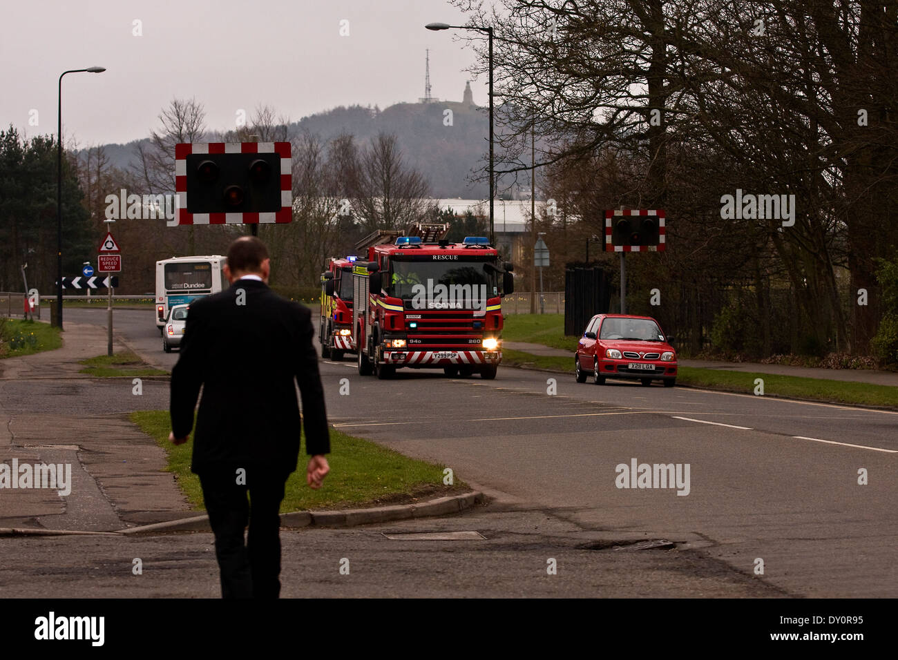 Fire trucks returning to the MacAlpine Road Fire Station at high speed
