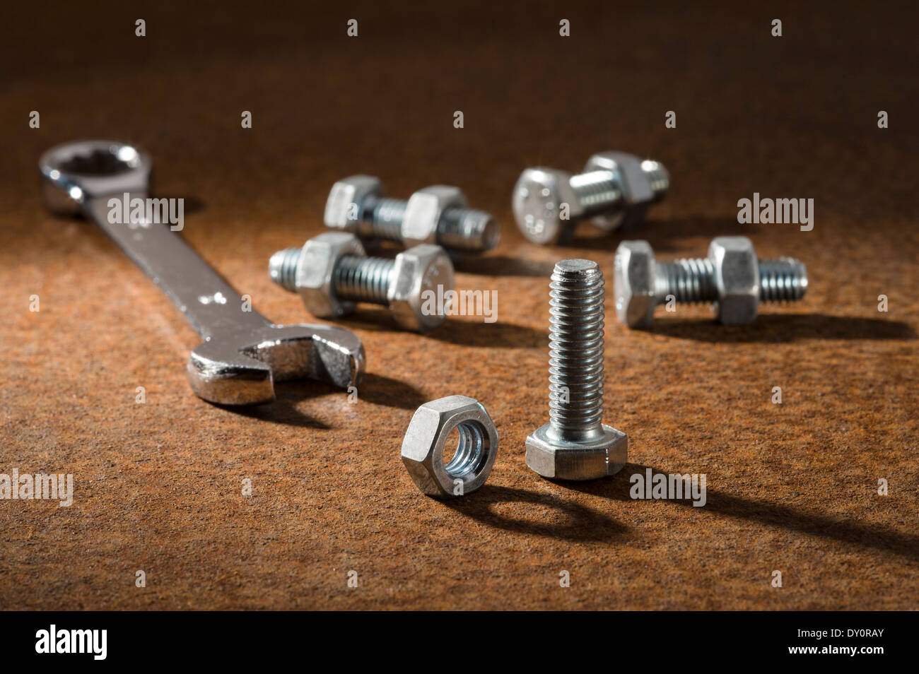 Nuts, bolts and spanner. Stock Photo