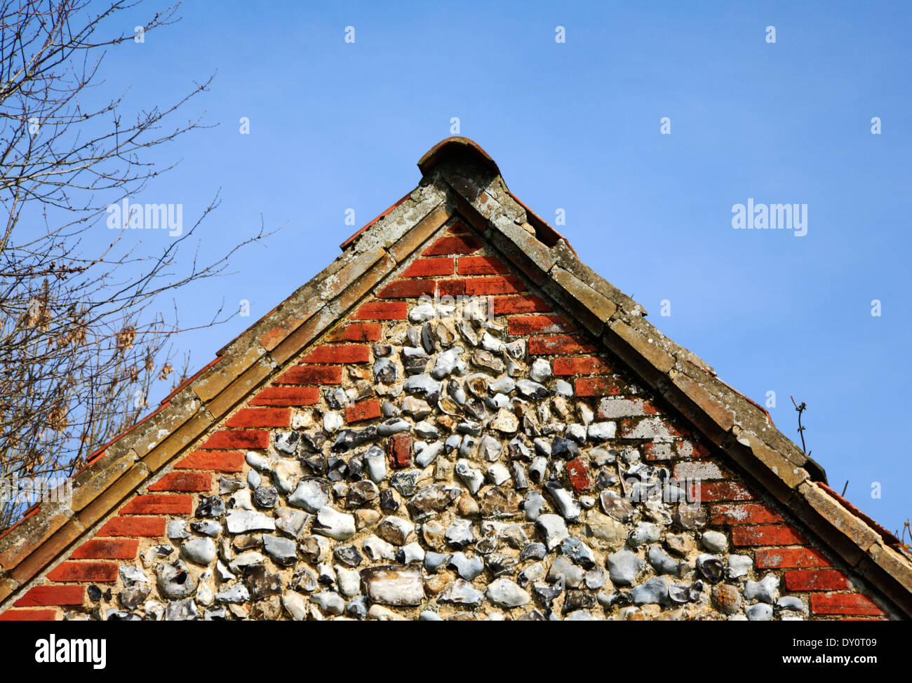 A pitched gable end on an old barn in the Norfolk countryside. Stock Photo