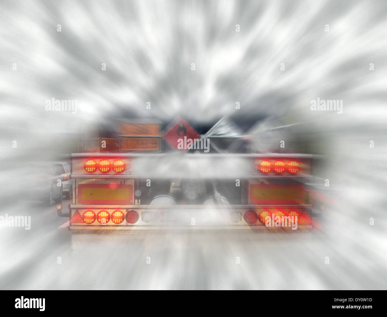 Flashing lorry stoplights during fog with simulated speed Stock Photo